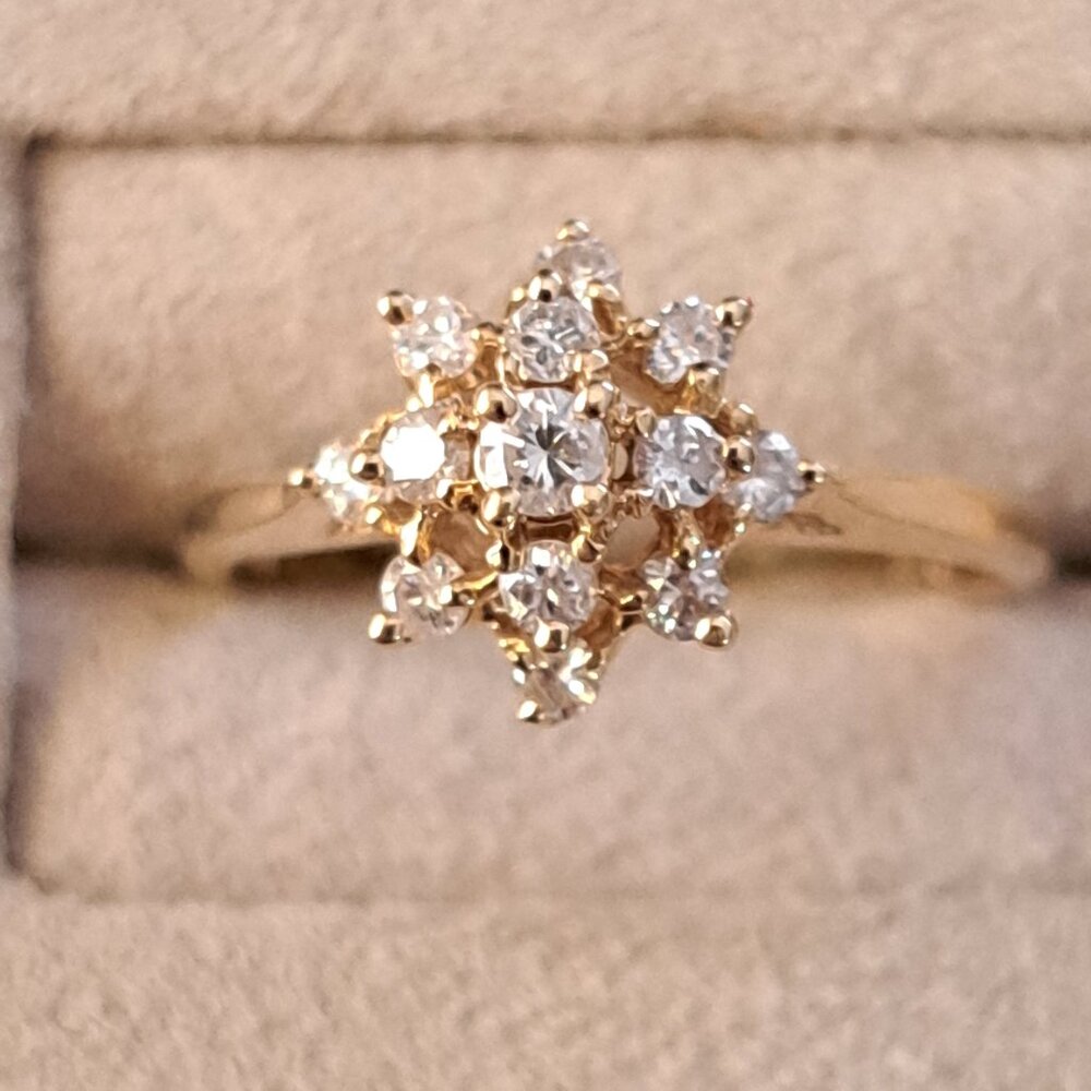 Diamond and 14kt yellow gold Ladies Cluster ring.